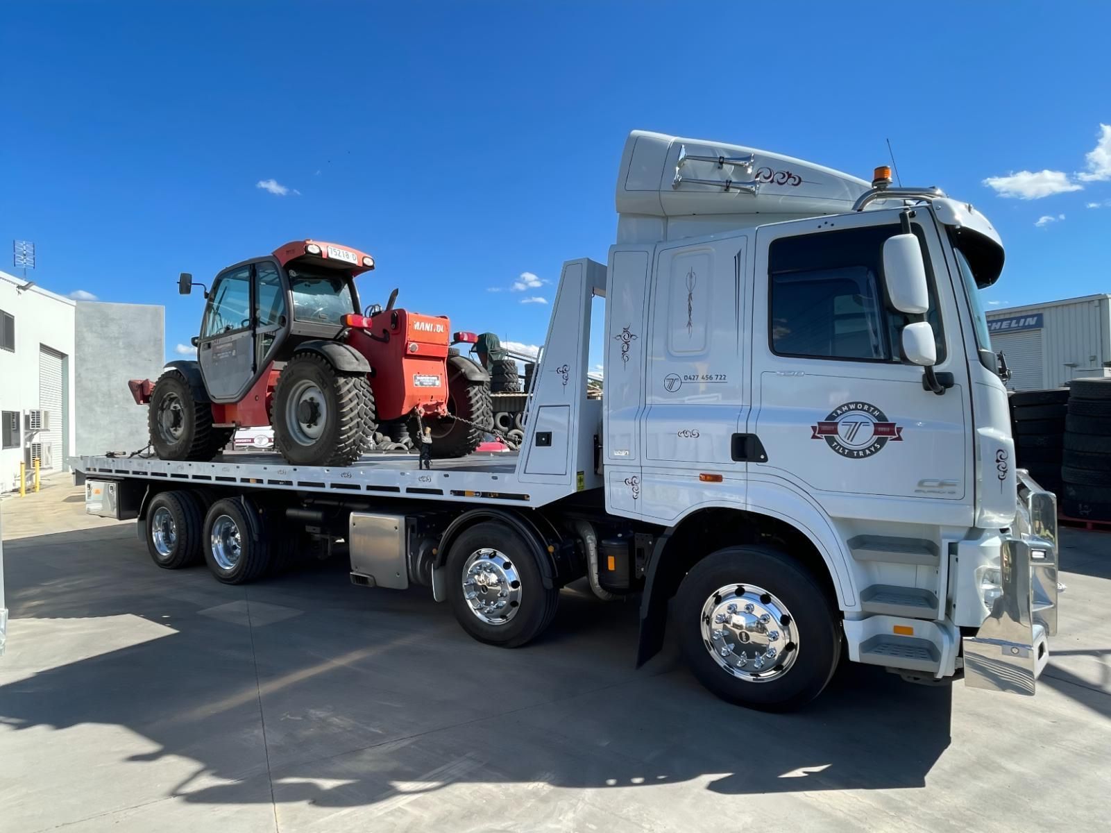 A White Flatbed Truck Parked Outdoors — Tamworth Tilt Trays in Tamworth, NSW