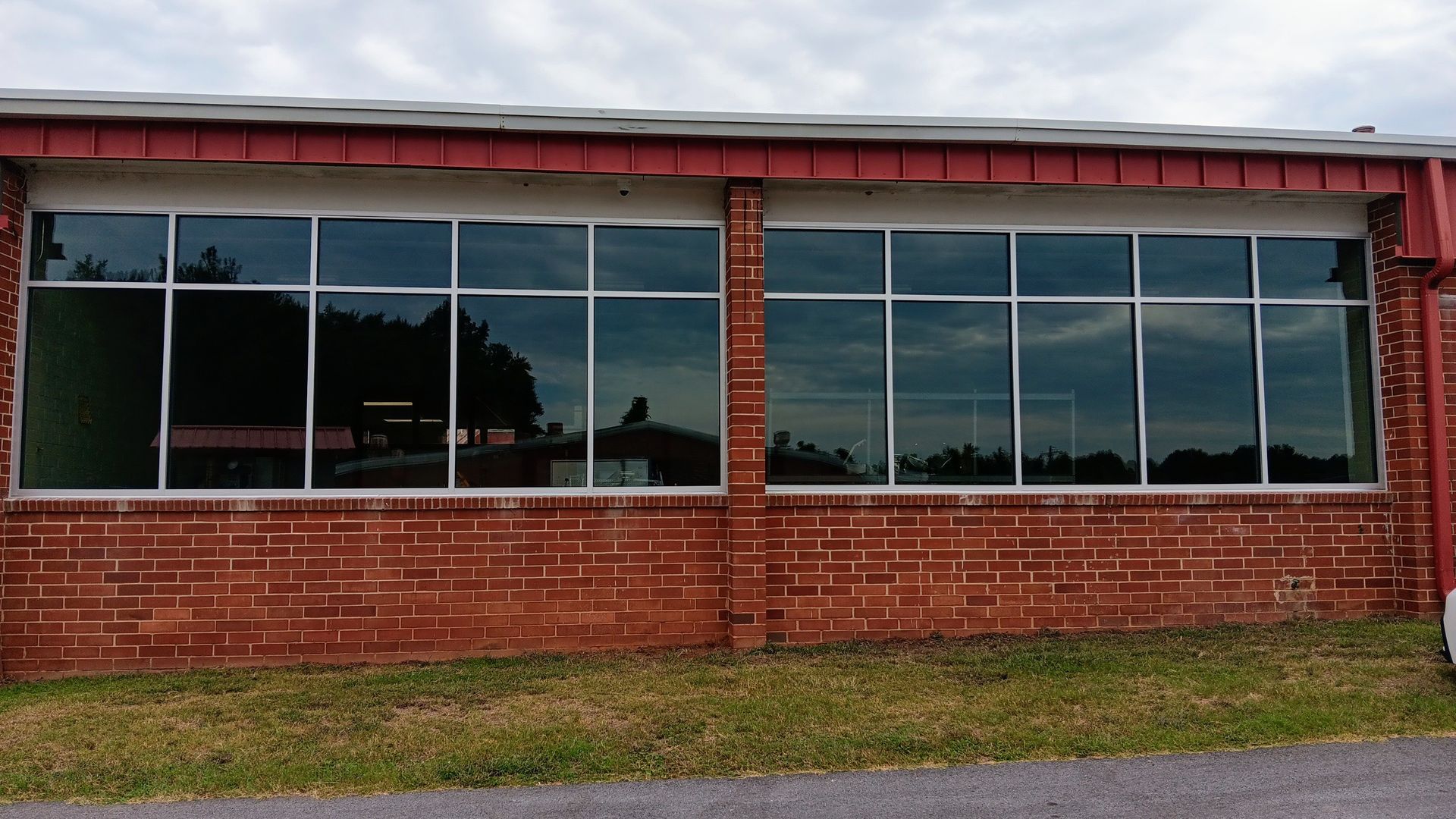 A man and a woman are looking at a house plan.