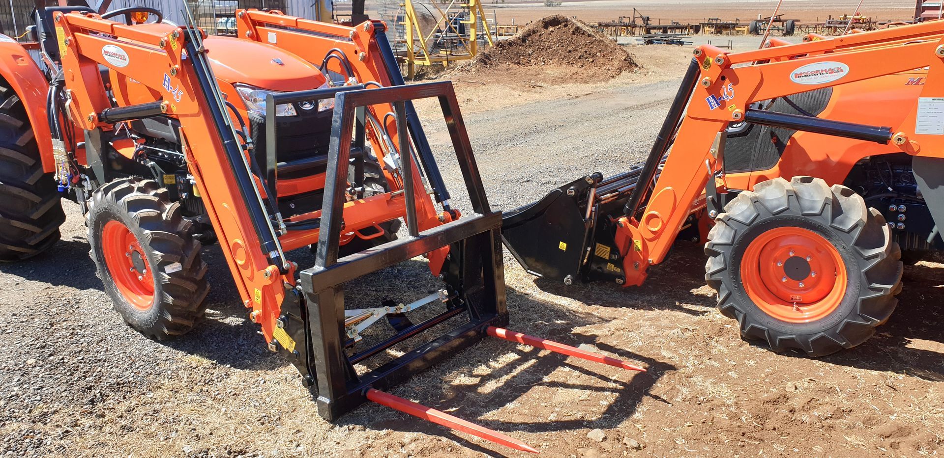 Kubota tractor with hay bale fork