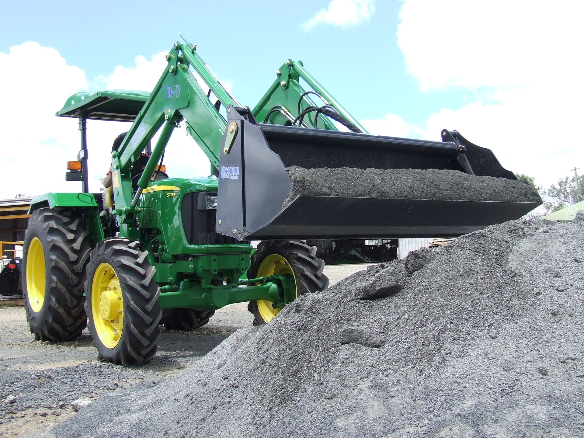 John deere tractor with 4 in 1 bucket