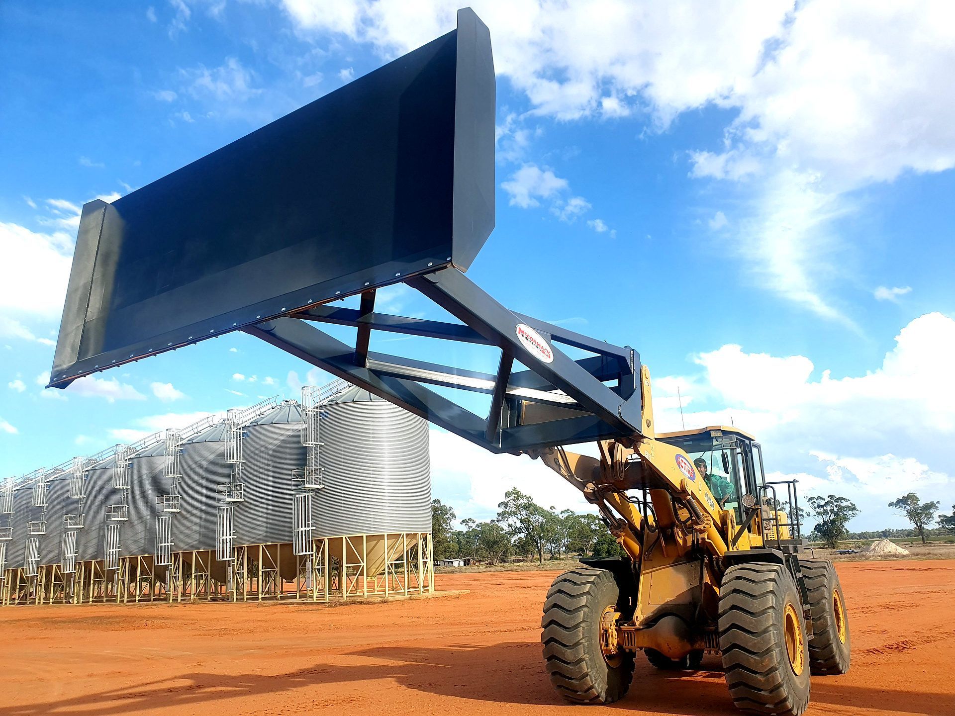 Industrial grain pusher