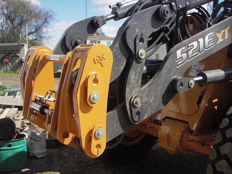 A close up of a case 580ex tractor