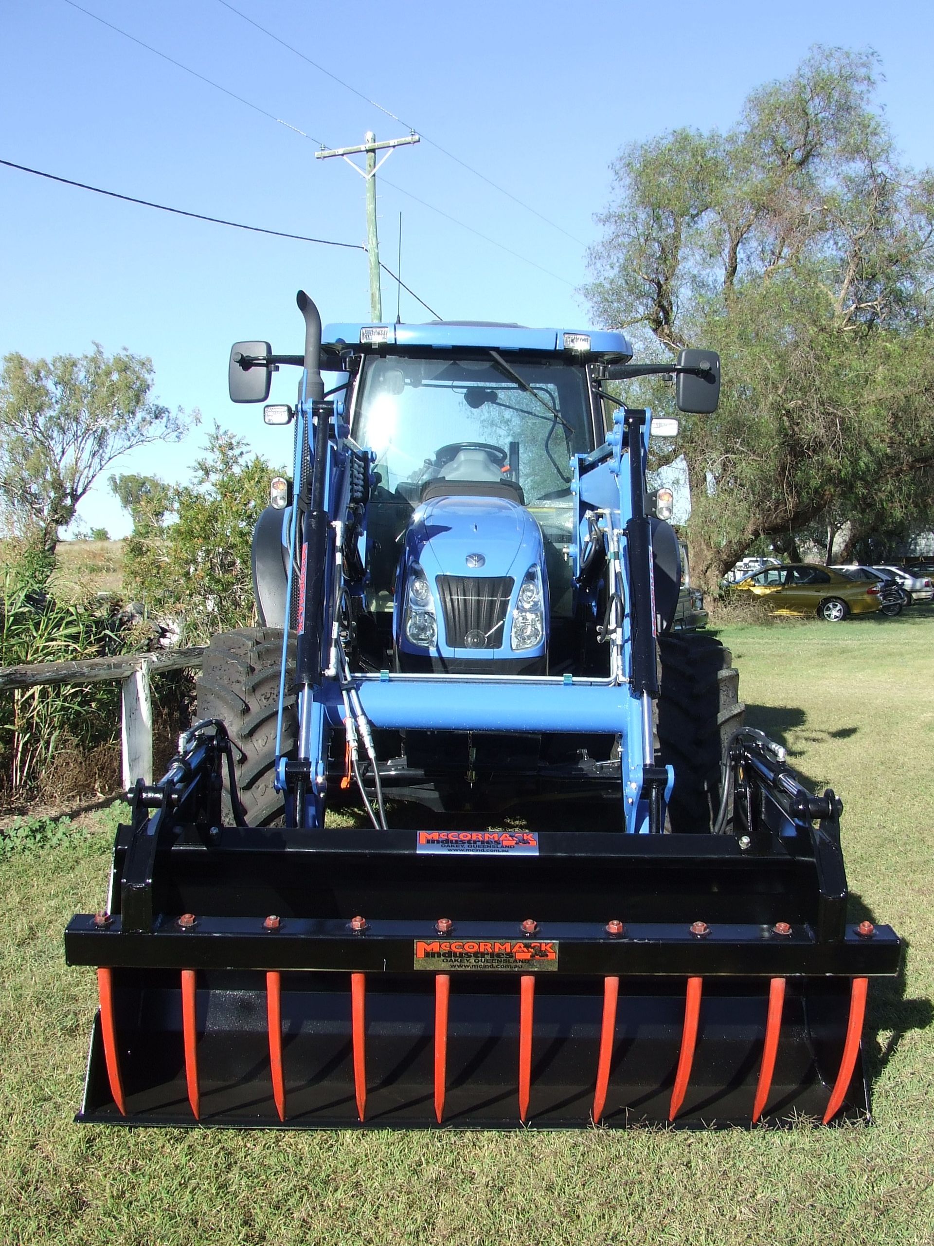 Bolt on silage bucket grab