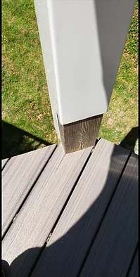 close-up of wooden panels meeting beam