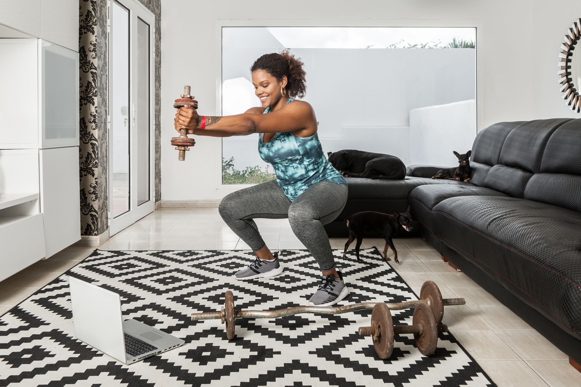 Woman smiling doing a home workout