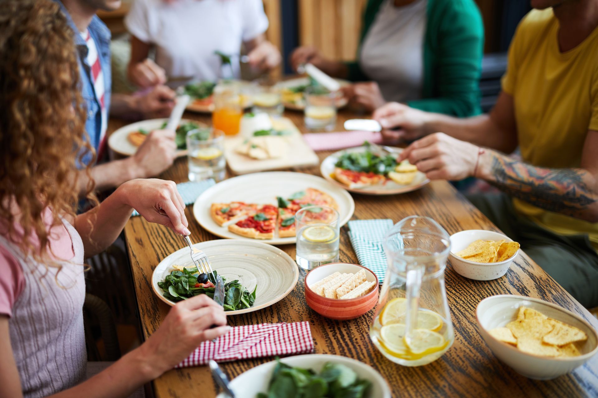 people eating healthily around a table