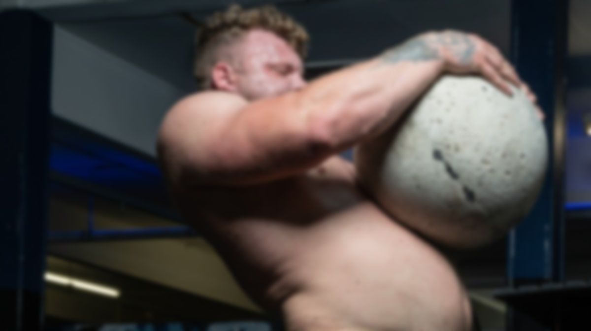 Strongman lifting atlas stone