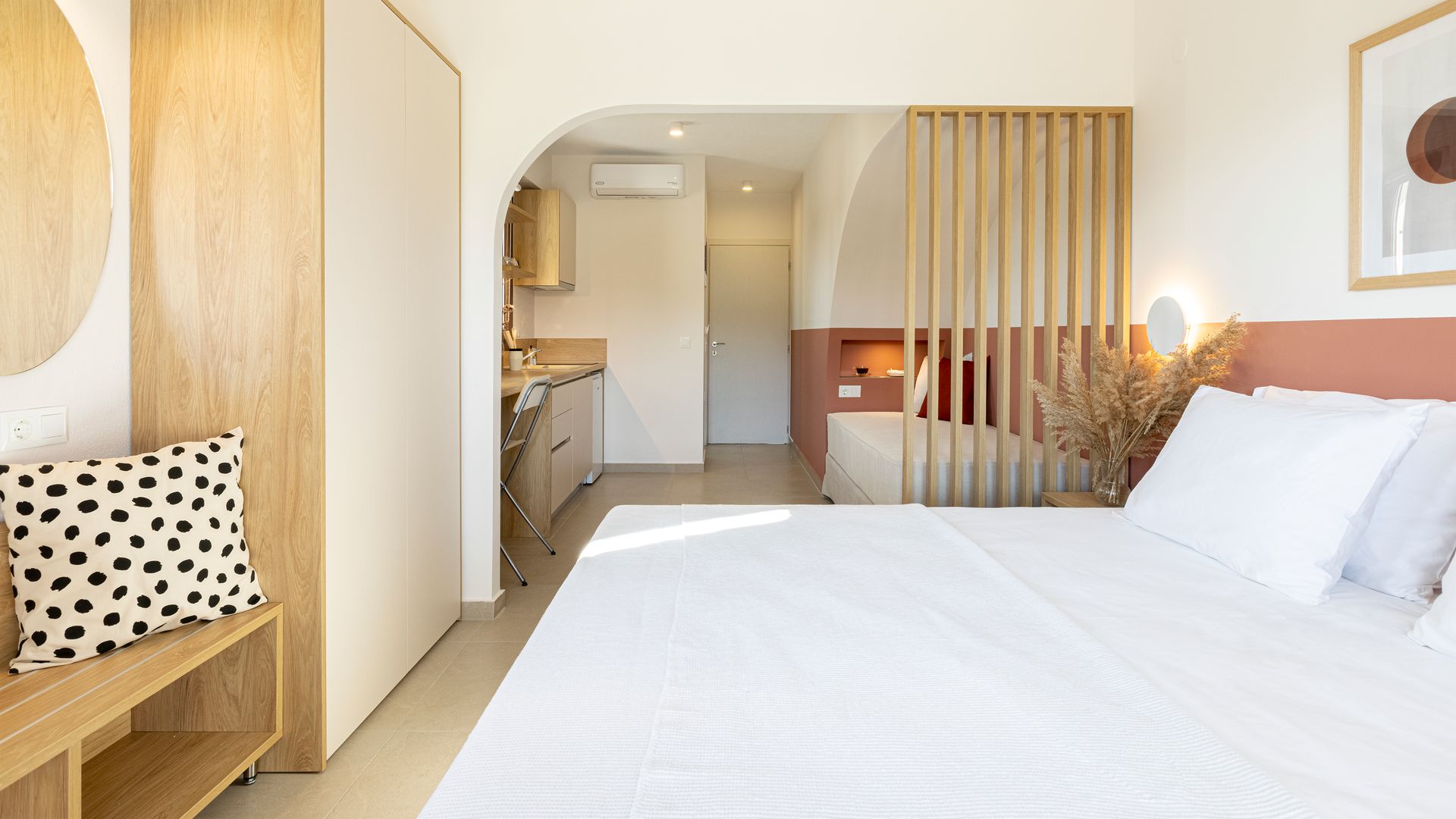 There is a bed in the middle of the room.