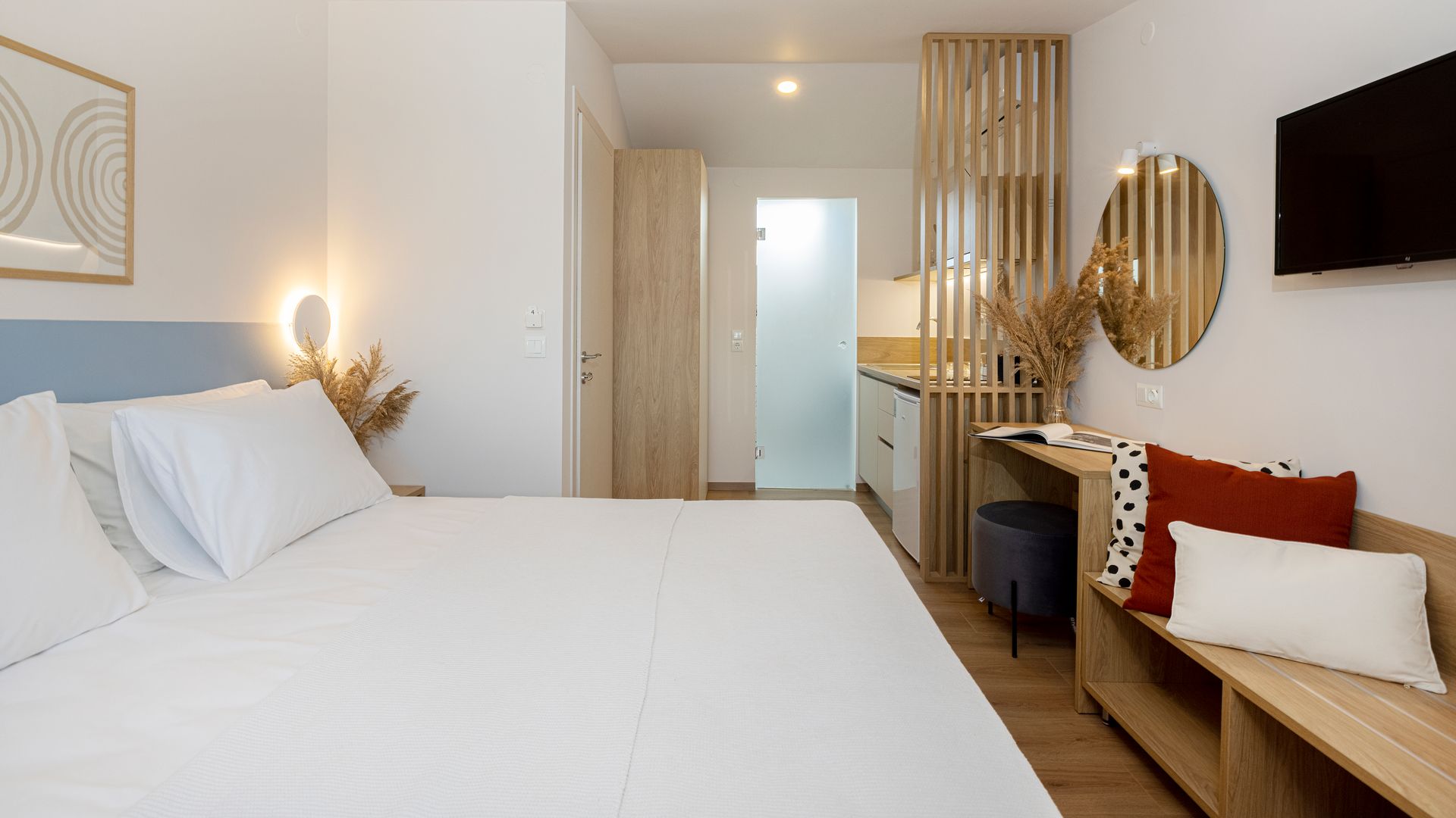 There is a large bed in the middle of the room.