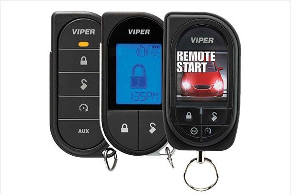 Three viper remote starts are sitting next to each other on a white surface.
