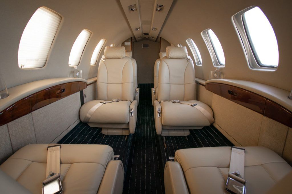 CJ2 private jet interior detailing in Florida hangar