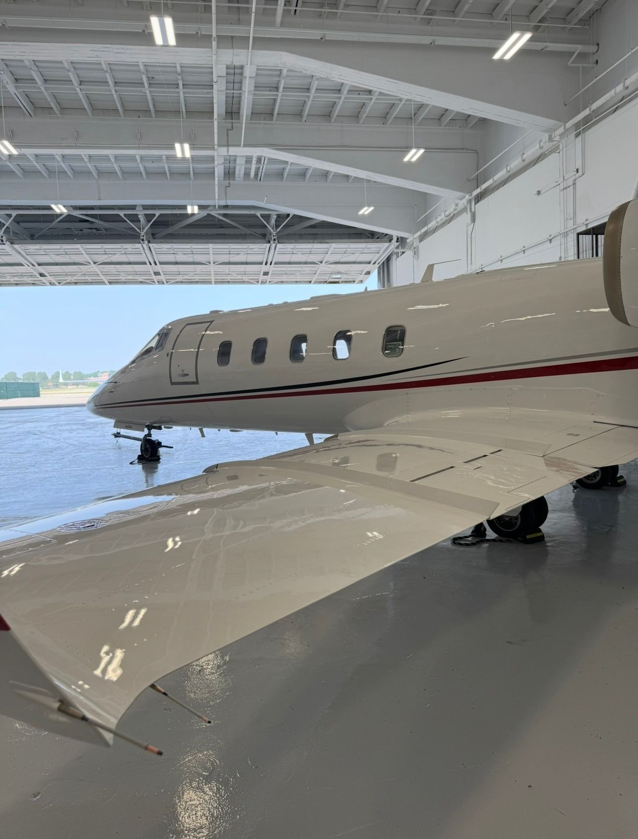 Aircraft exterior cleaning inside Florida hangar