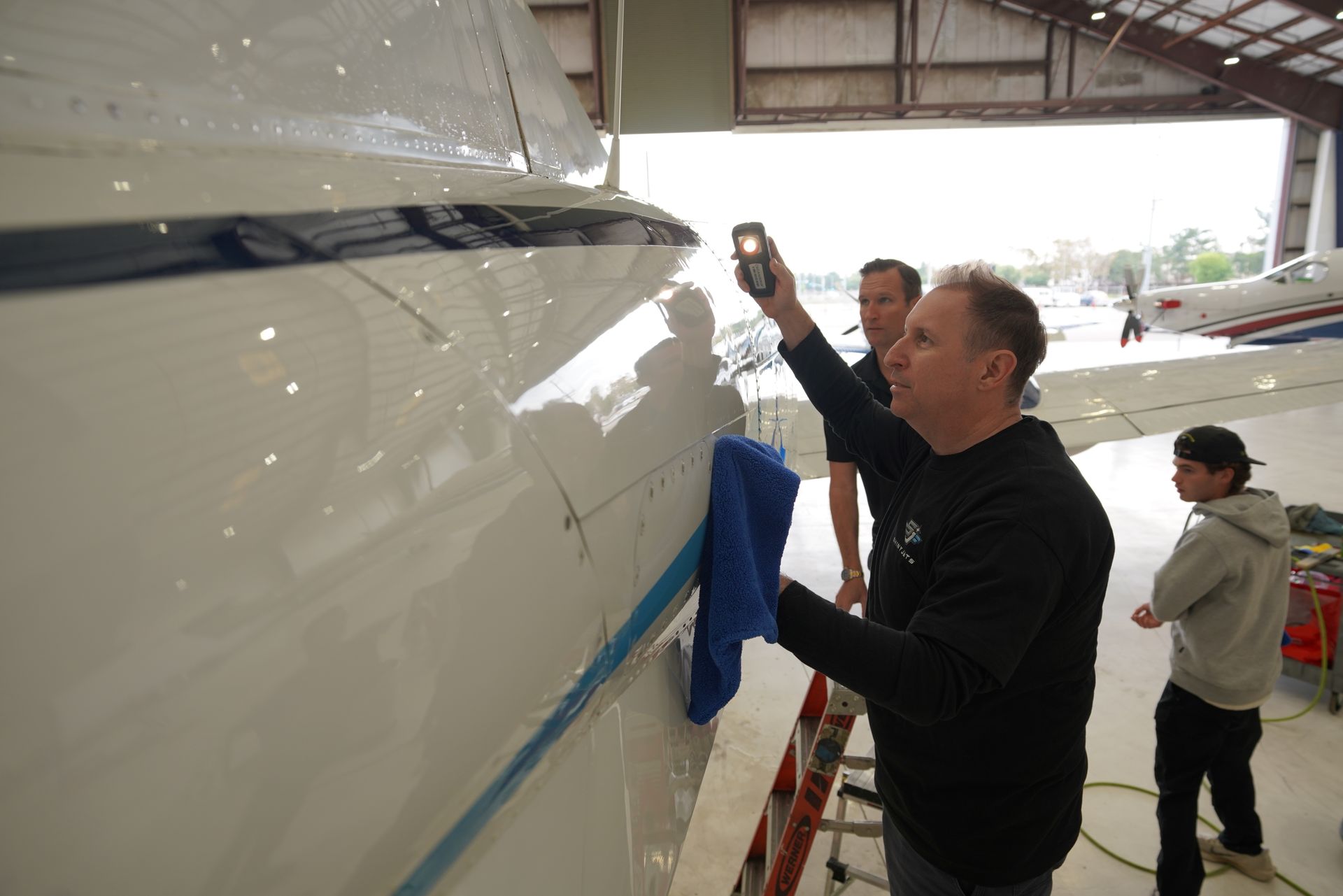 On-site aircraft detailing service performed inside hangar at DAB airport