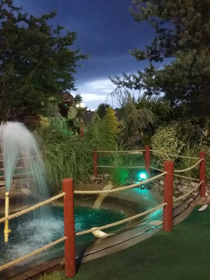 There is a fountain in the middle of the park.