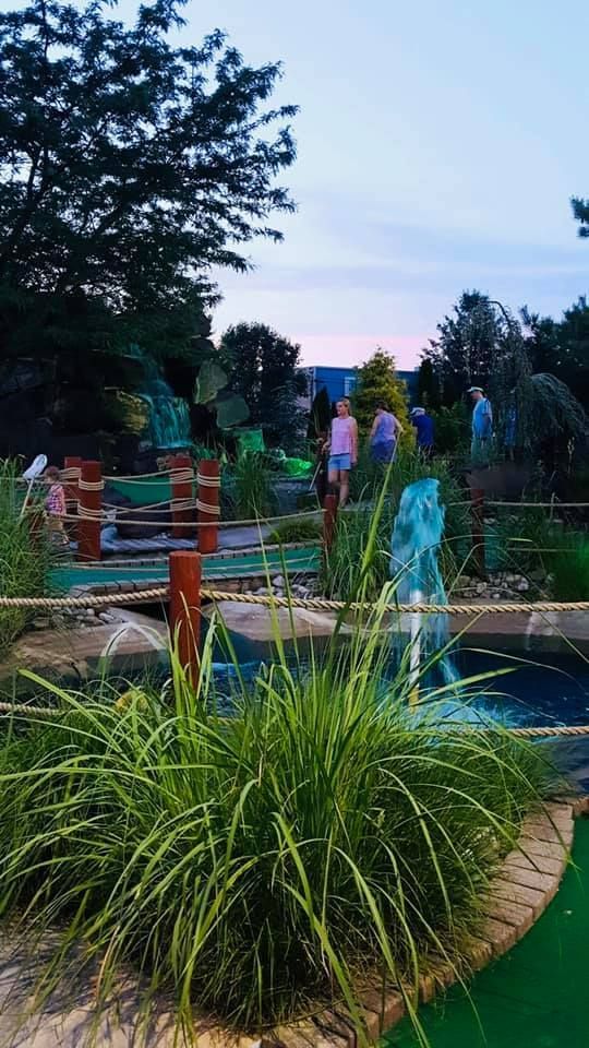 There is a fountain in the middle of the park.