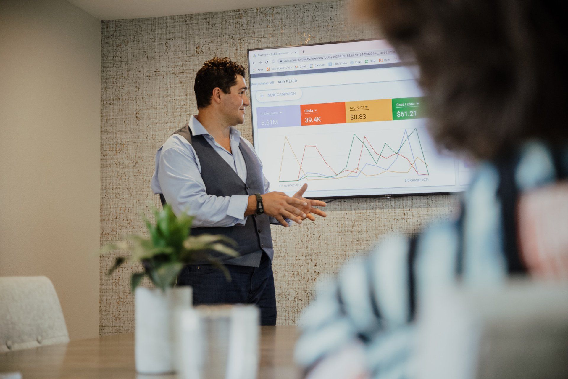 A man is giving a presentation to a group of people