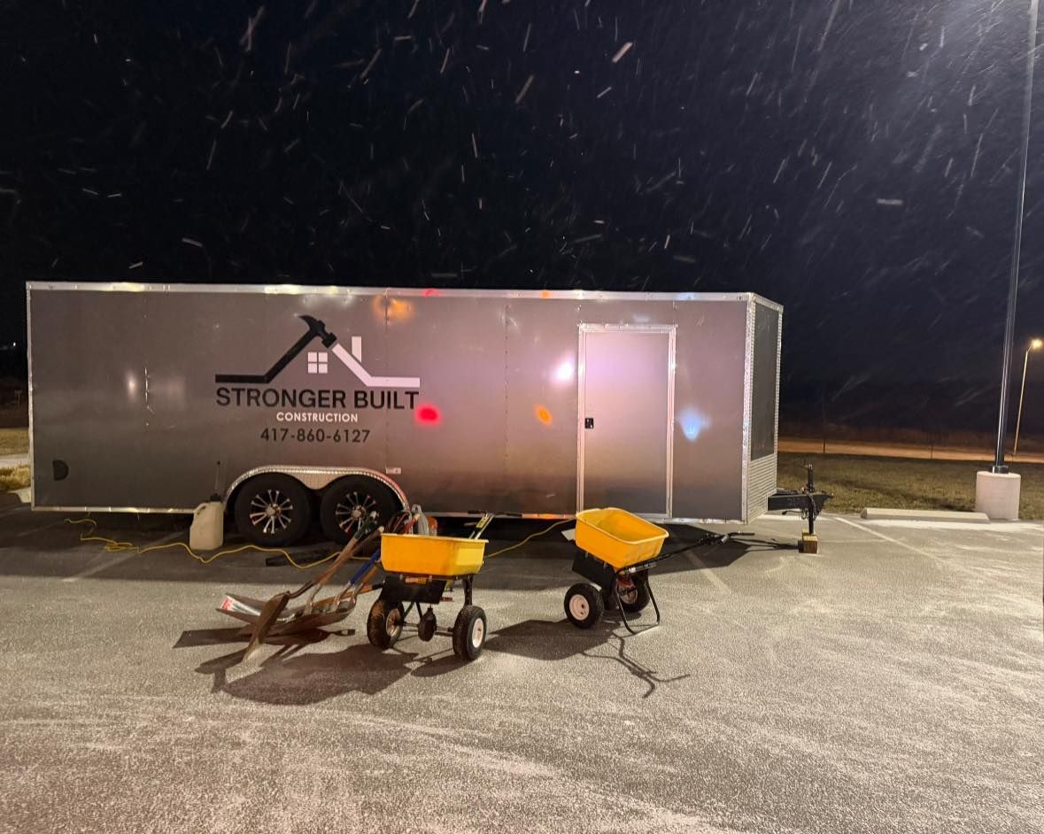 A grey cargo trailer branded 