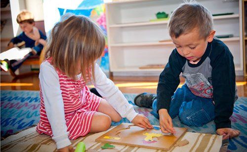 Kids playing puzzle 