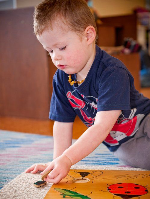 Boy playing puzzle game