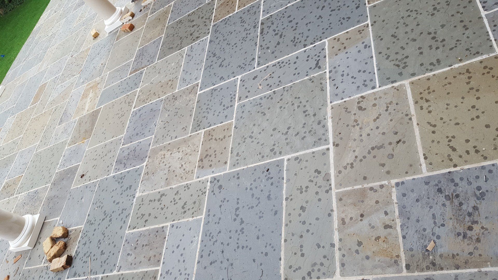 A patio with a lot of tiles on it