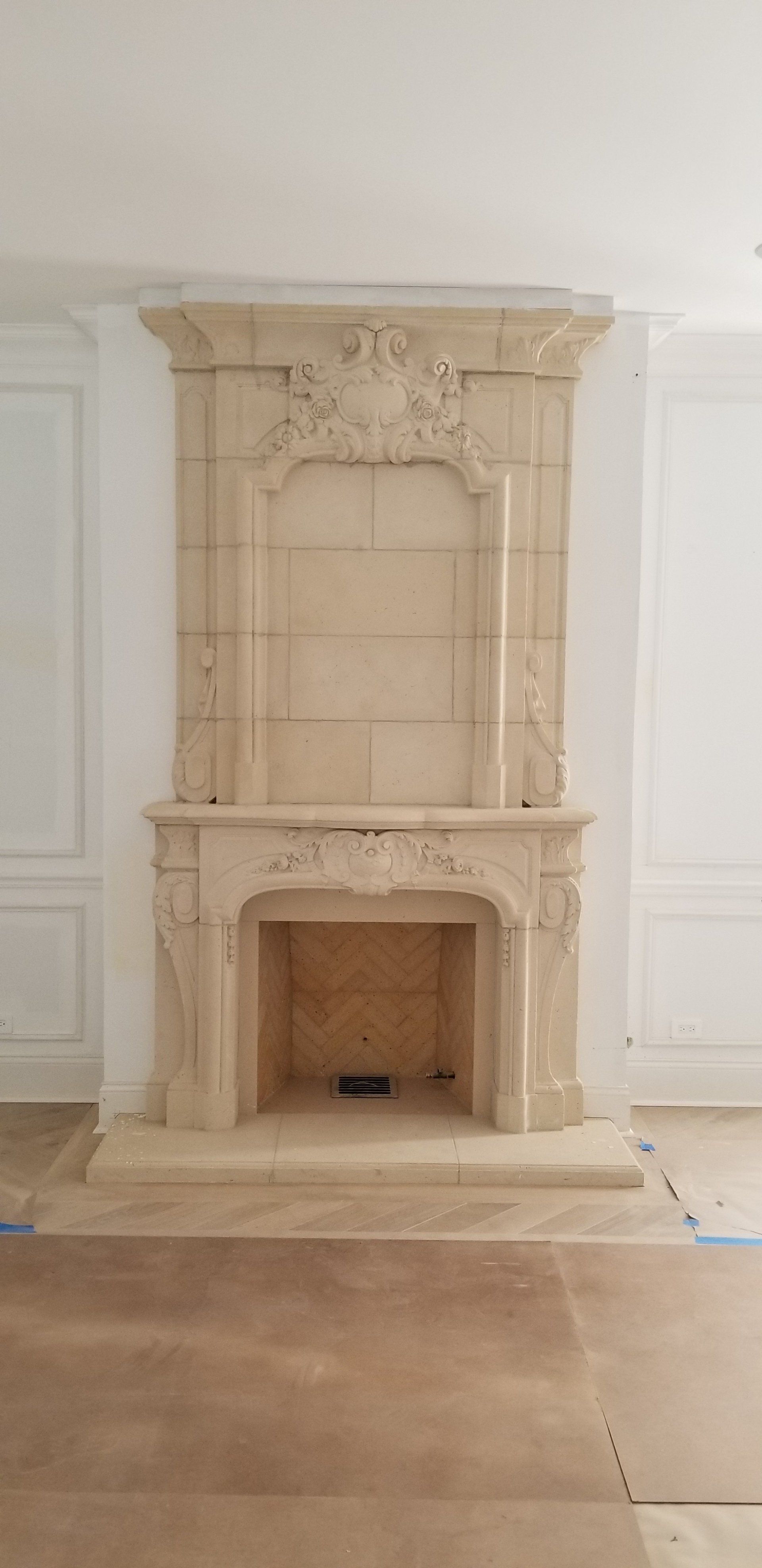 There is a fireplace in the middle of the room.