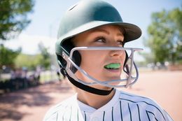 girl wearing mouth guard for sports