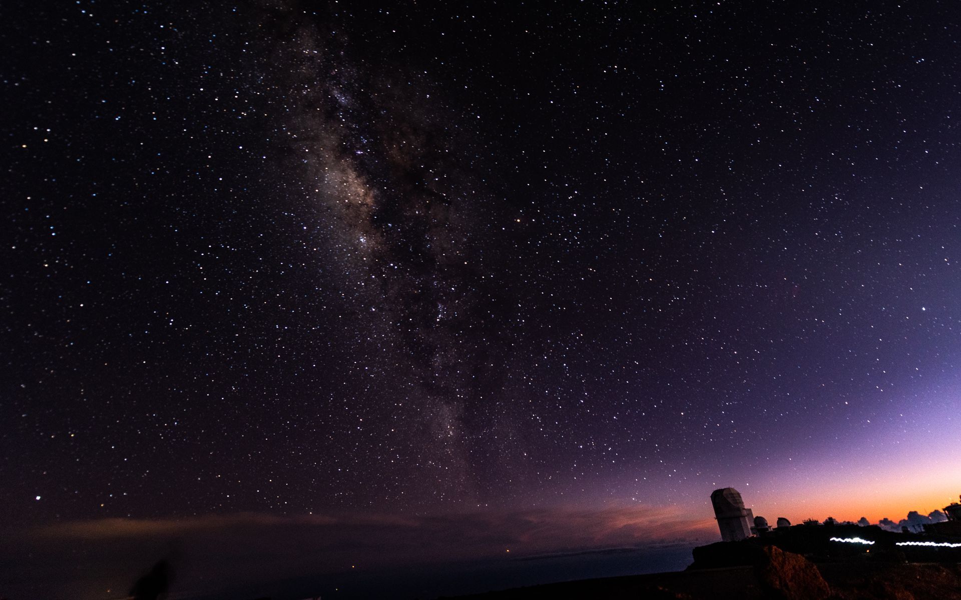 The milky way is visible in the night sky