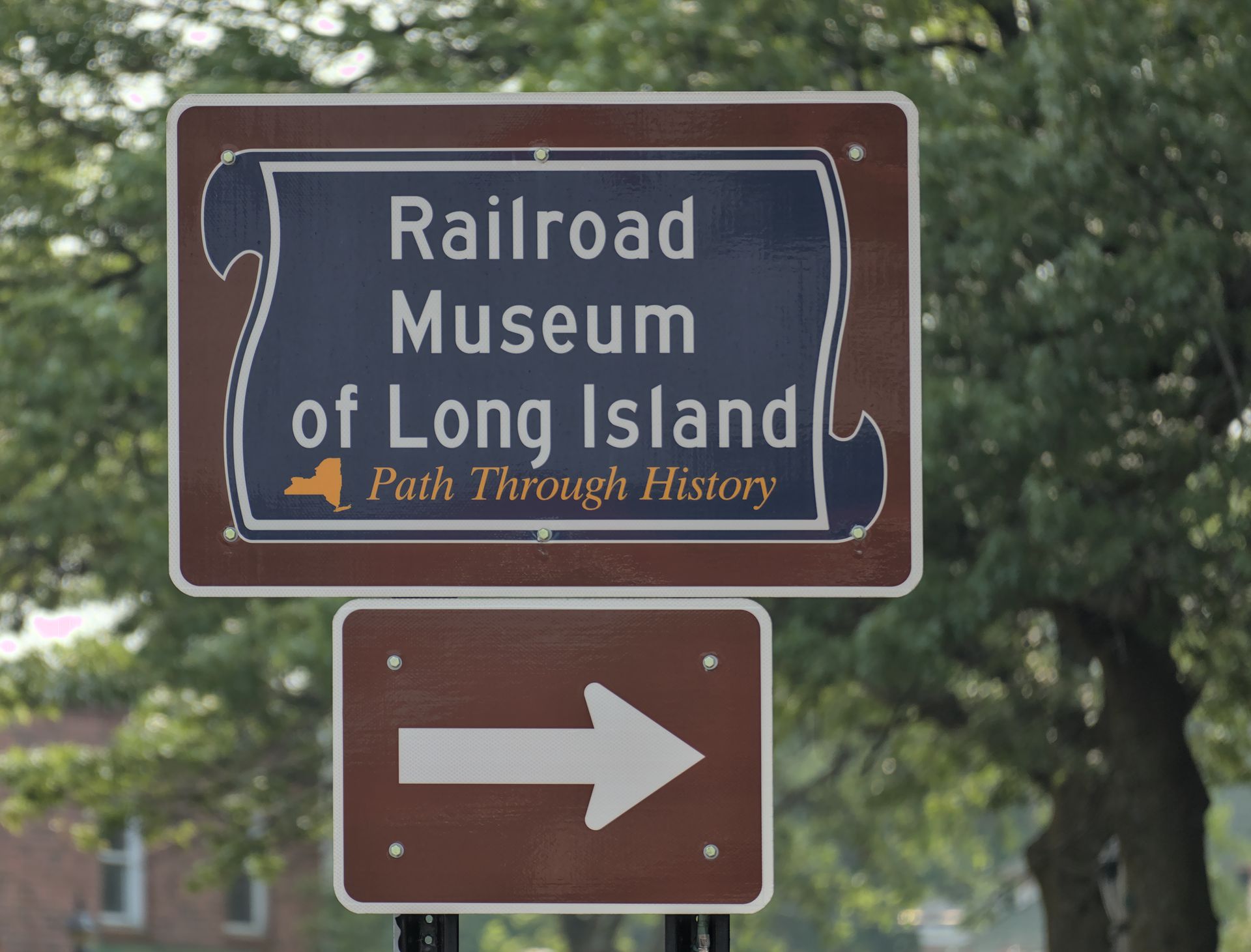 A sign for the railroad museum of long island