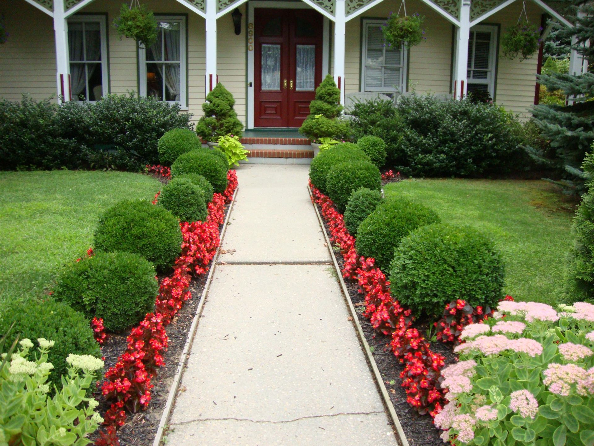 A walkway leading to the front door of a house