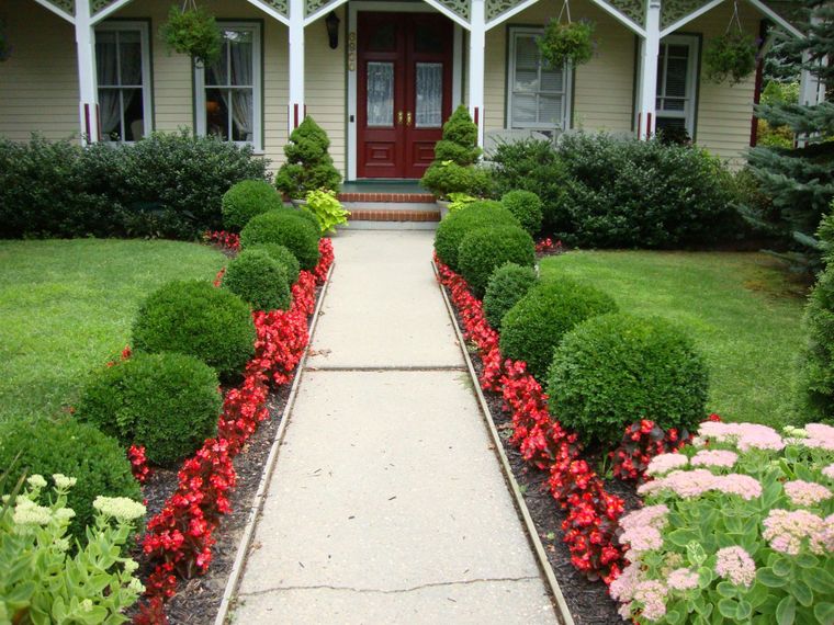 A walkway leading to the front door of a house