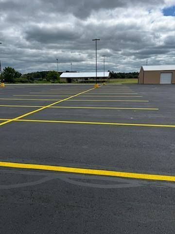 Fresh yellow parking lot striping lines in Kansas City commercial parking lot