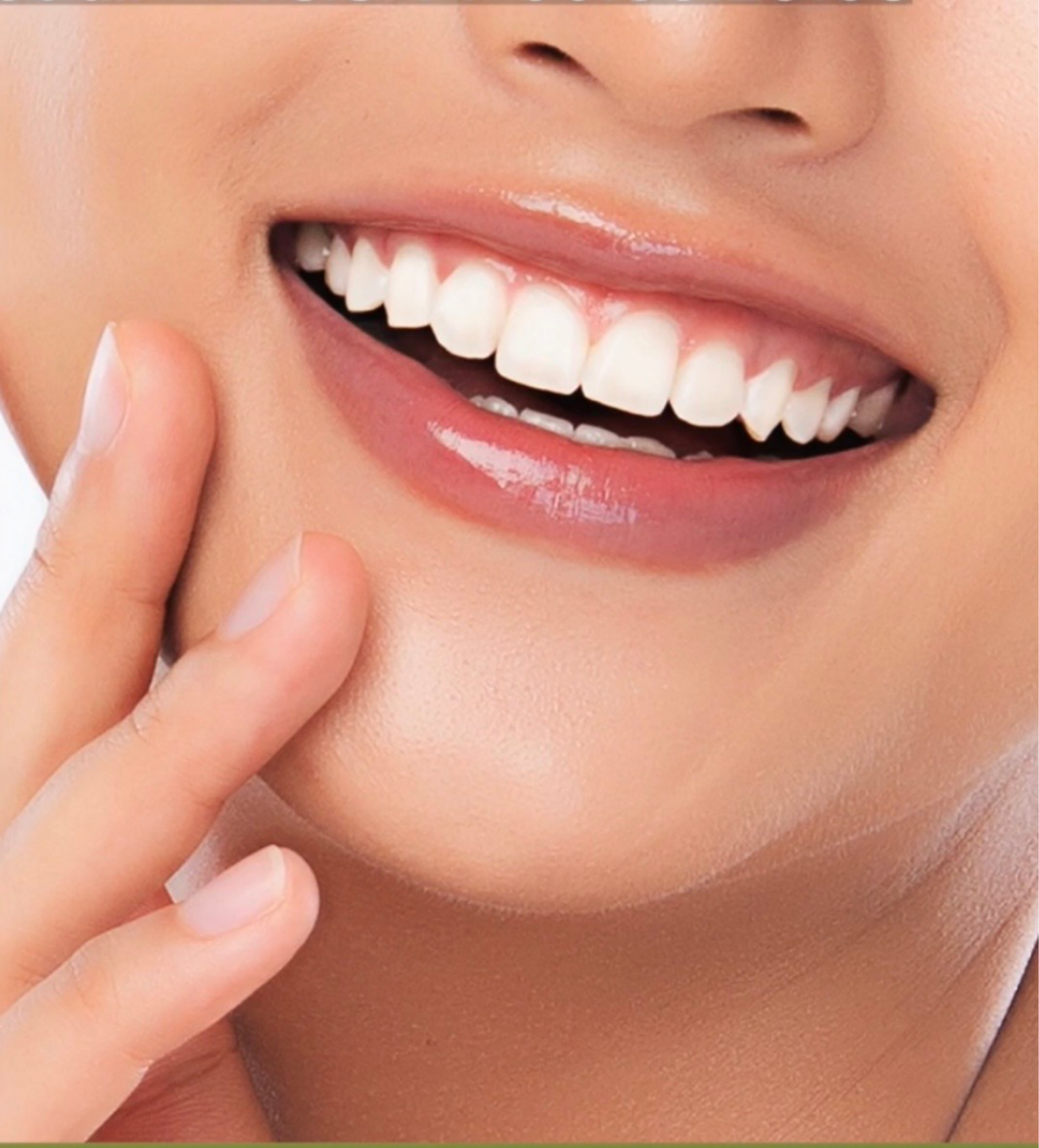Close-up of a smiling mouth with white teeth and glossy lips, fingers gently touching the face