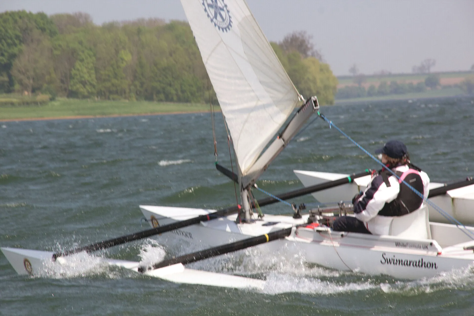 disabled sailor in a Challenger Trimaran going fast