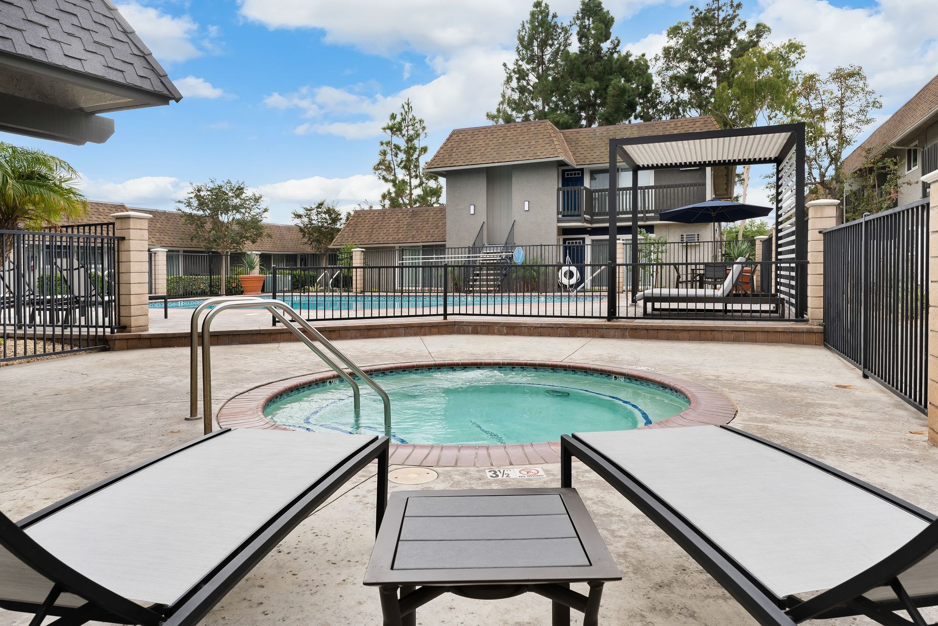 Spa tub with lounge chairs