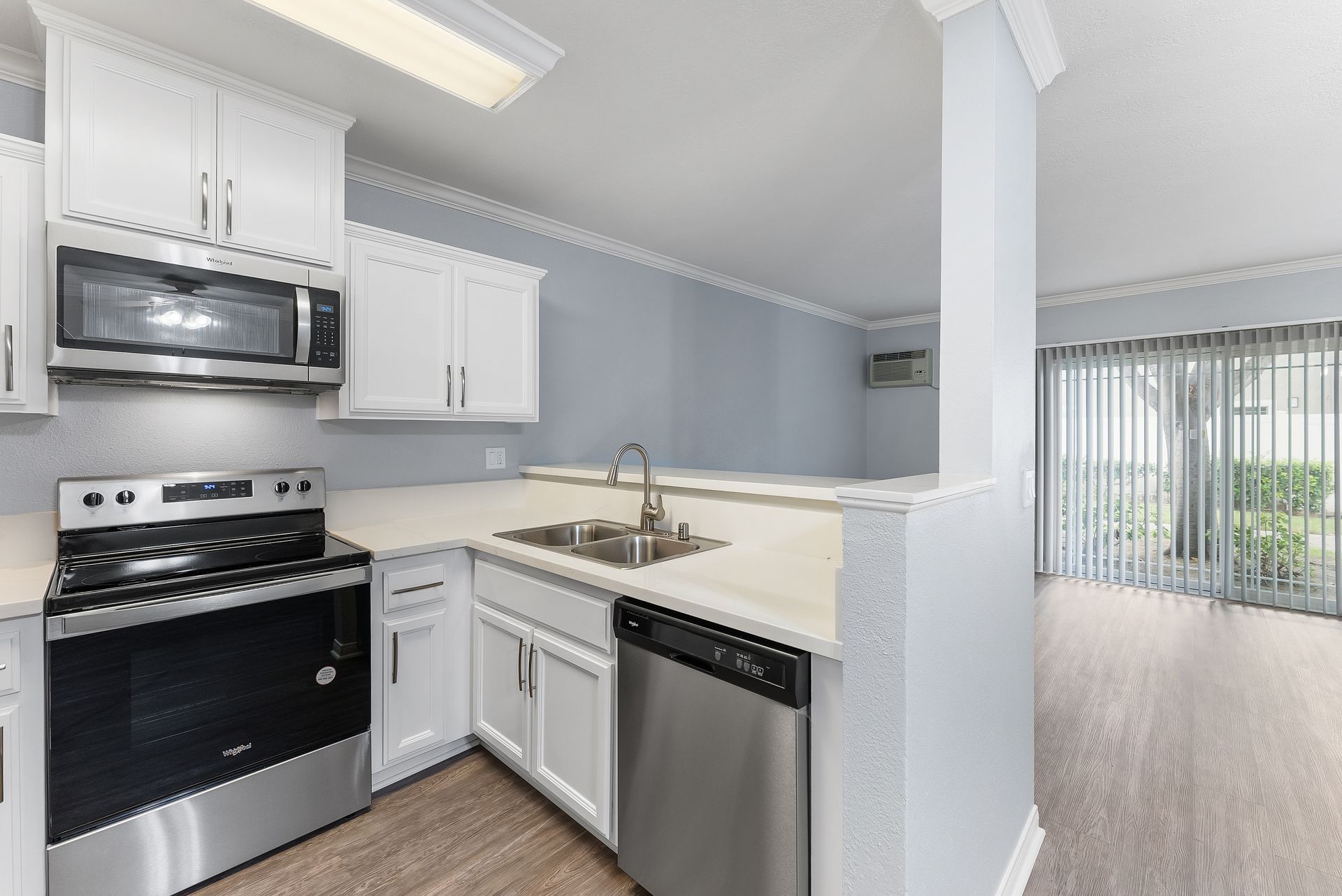 Kitchen island with sink and dishwasher