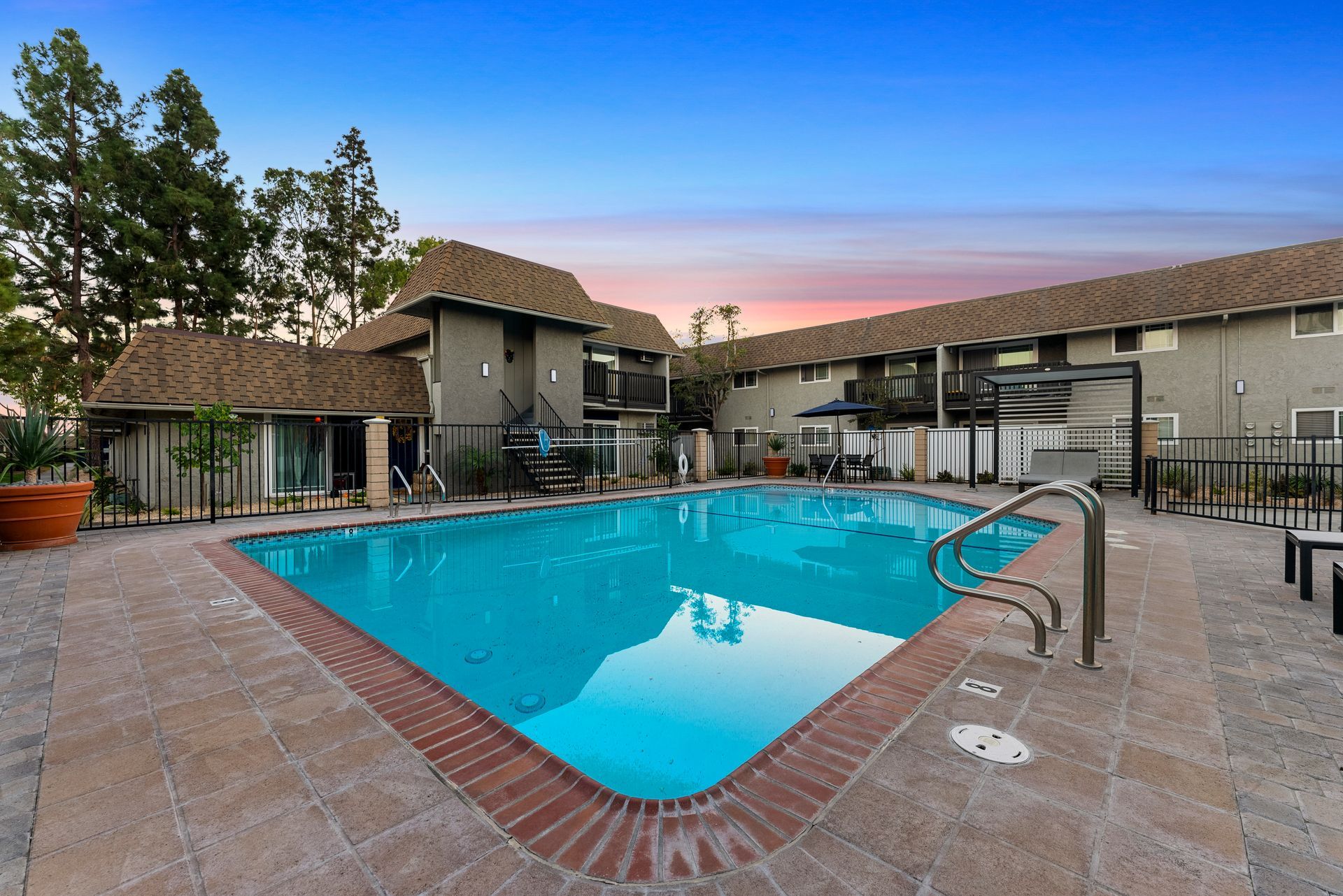 Pool and gazebo at dusk