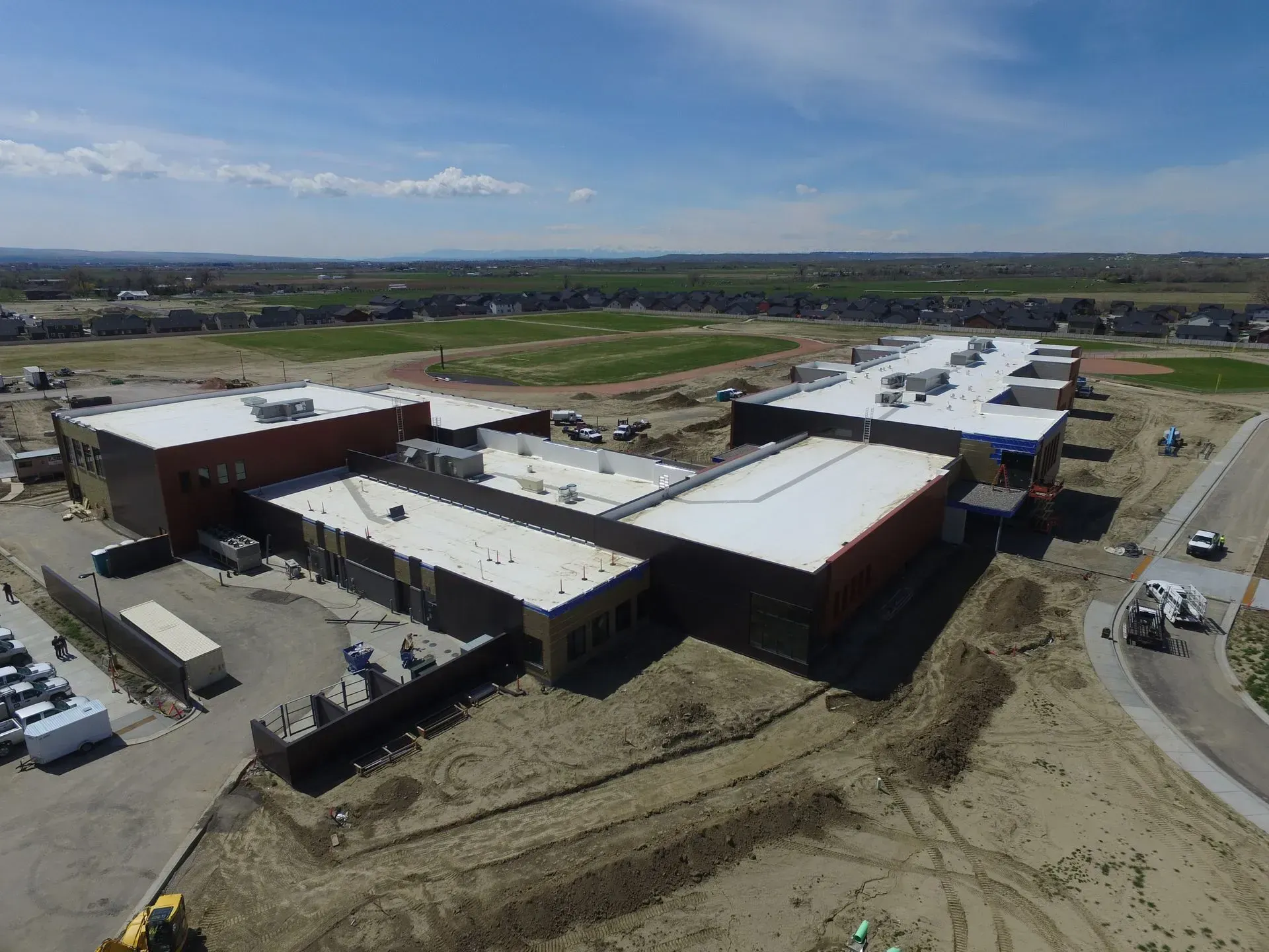 An aerial view of a large building under construction