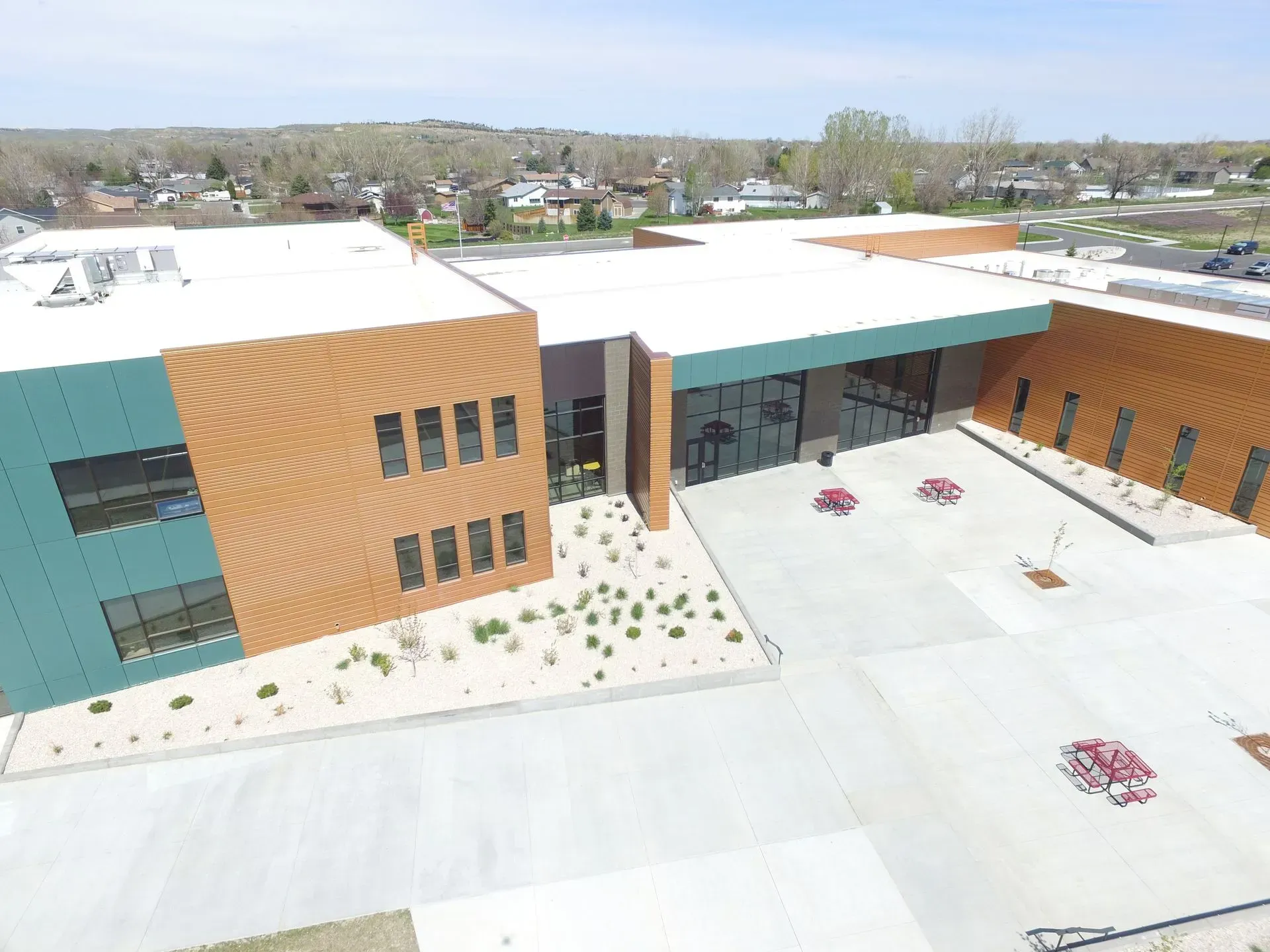 An aerial view of a large building with a lot of windows.