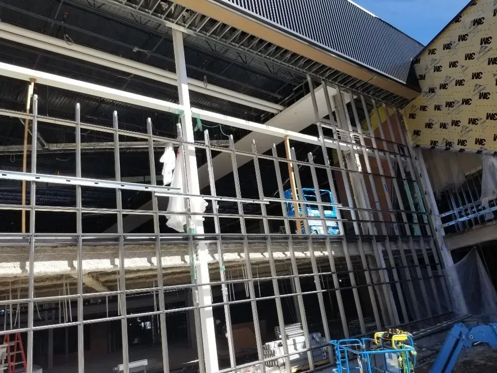 A large building under construction with a lot of windows