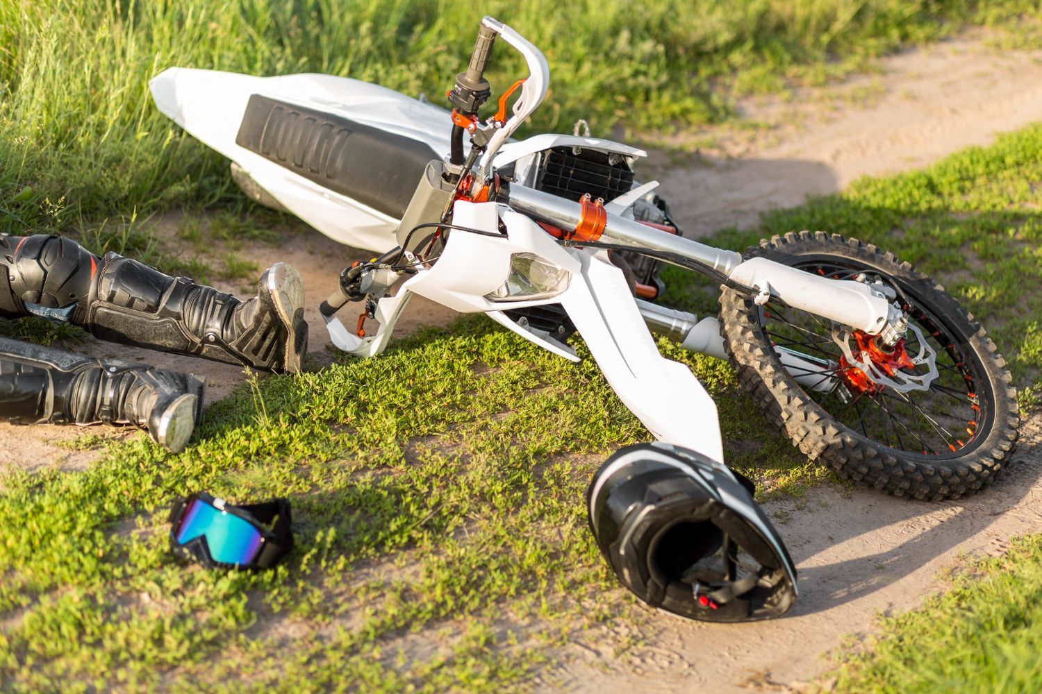 Cars in traffic during a rainstorm, illuminated taillights, blurred lights in the distance.