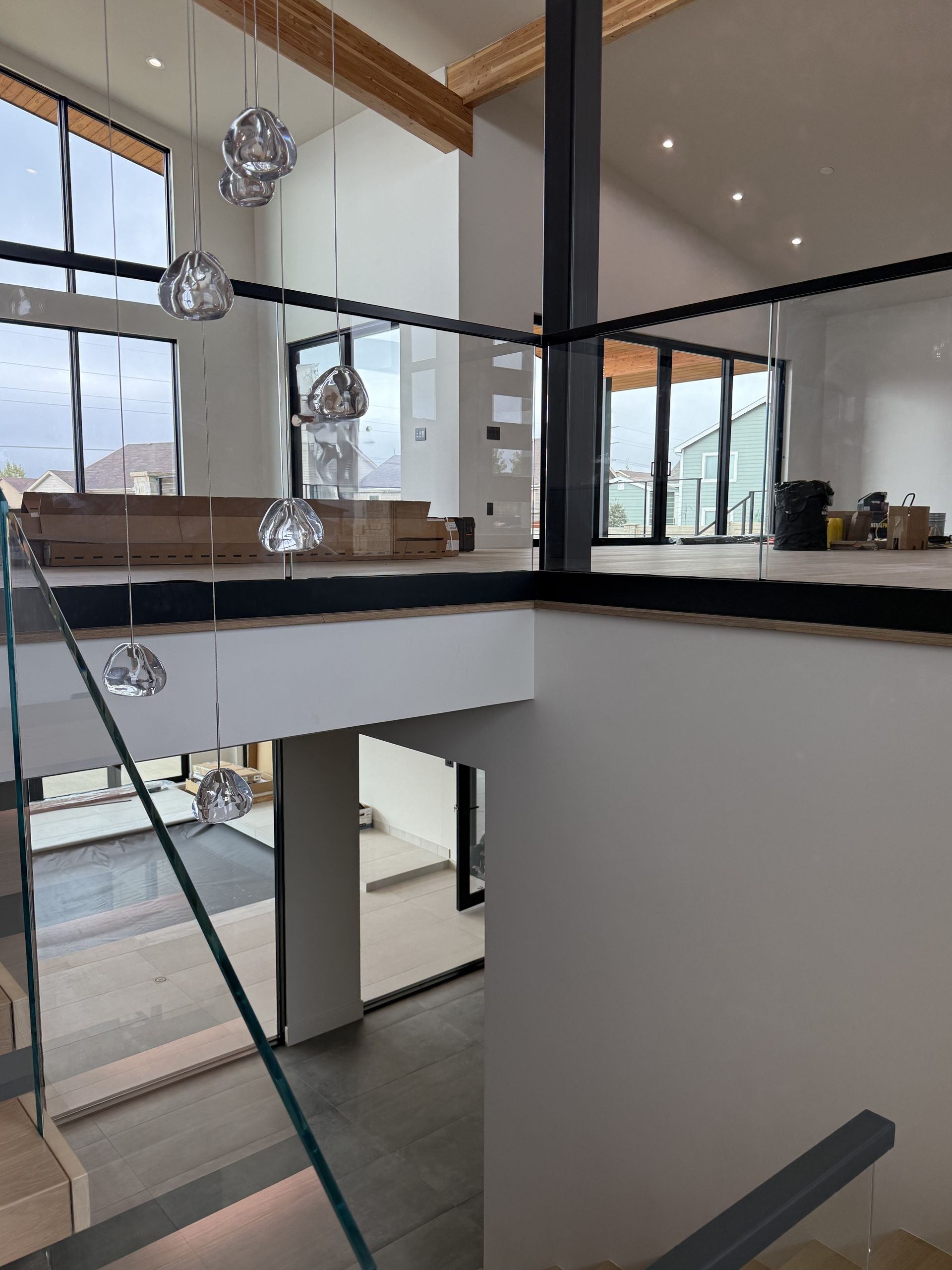 A bunch of cans of paint are sitting on a table.