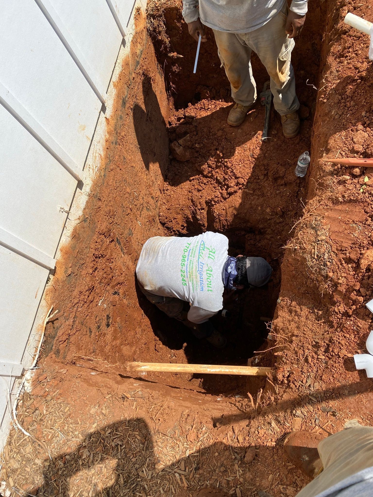 Another Shot of a Man on a Pit — Flowery Branch, GA — All About Irrigation and Landscape Services Inc