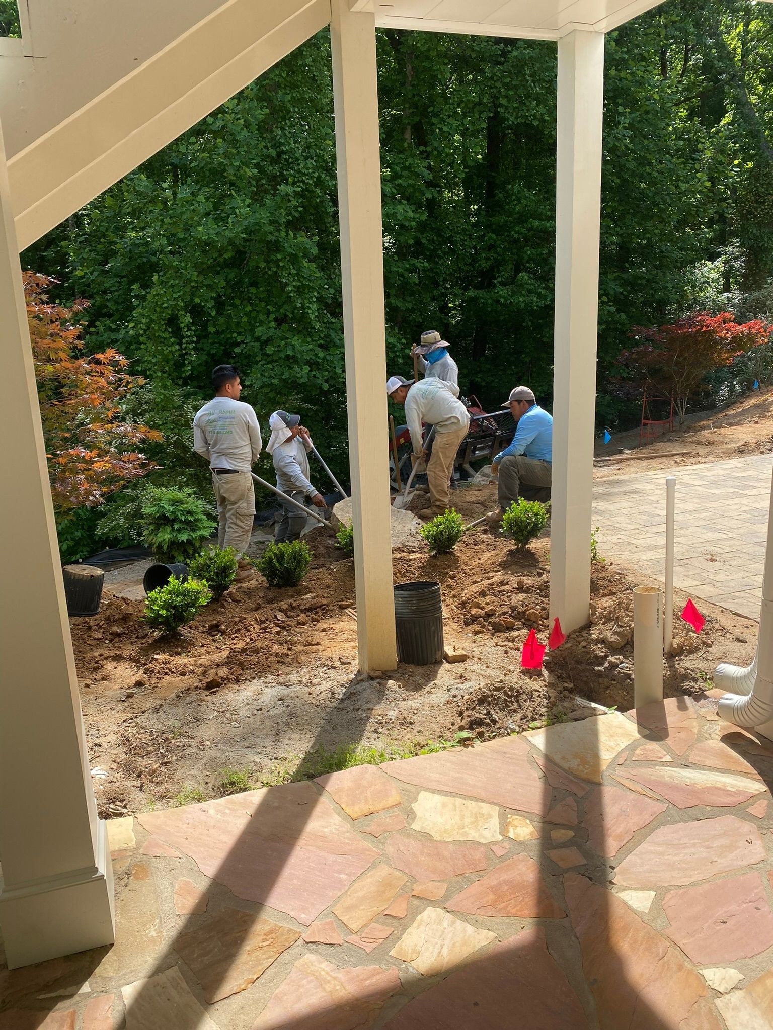 Men At Work On House Irrigation Project — Flowery Branch, GA — All About Irrigation and Landscape Services Inc