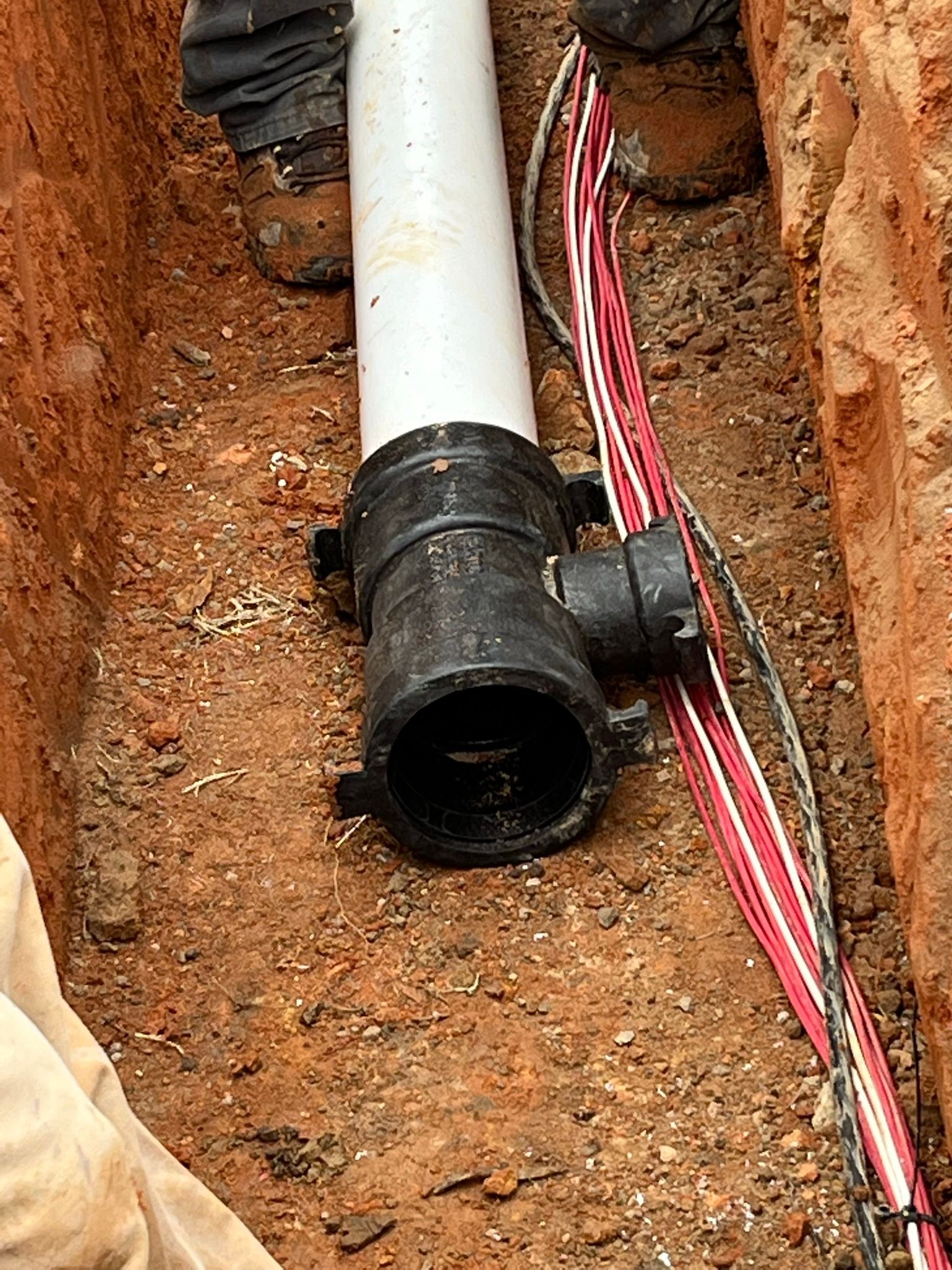 Black Pipe On Soil — Flowery Branch, GA — All About Irrigation and Landscape Services Inc