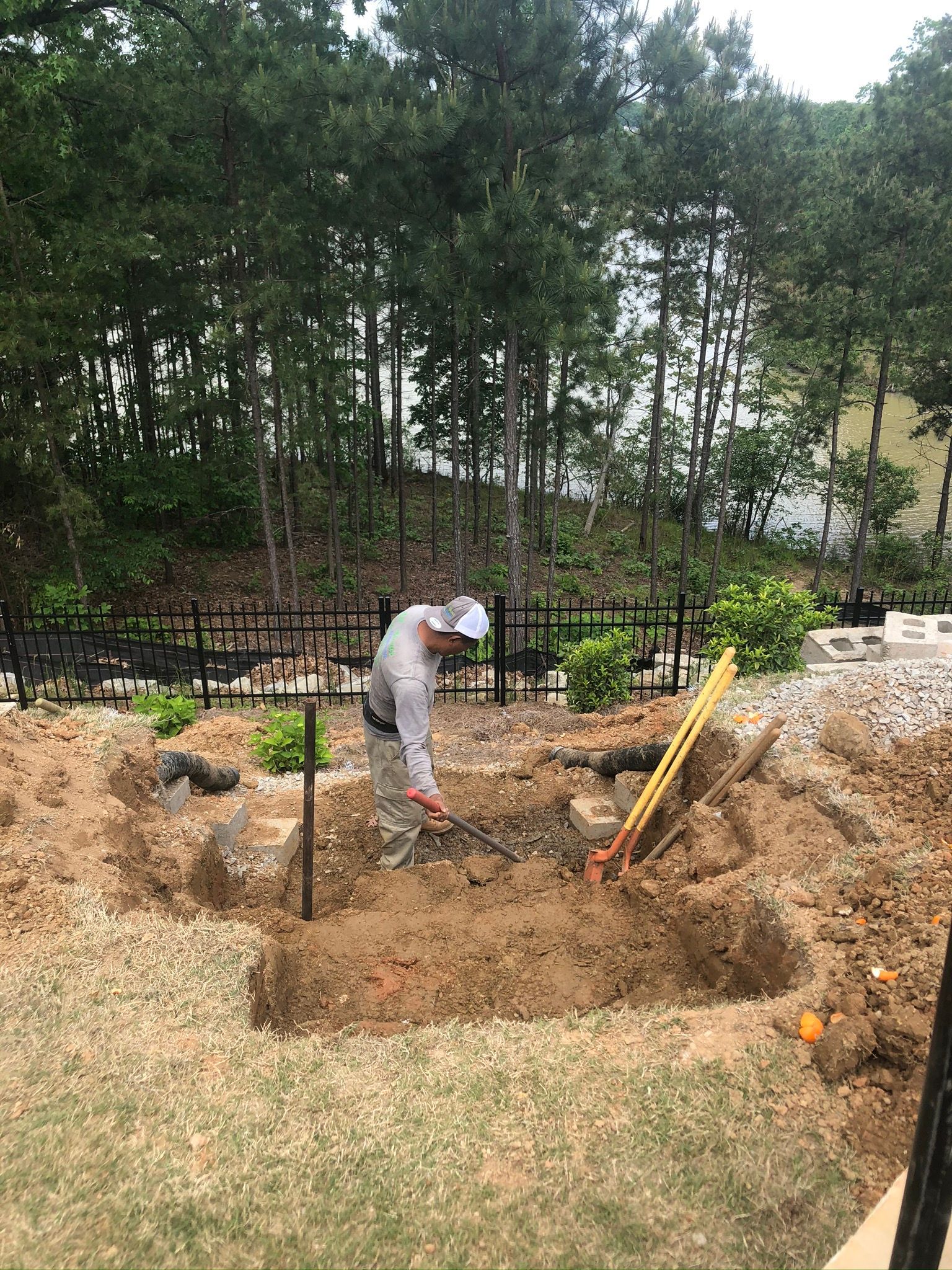 Men Digging Soil — Flowery Branch, GA — All About Irrigation and Landscape Services Inc