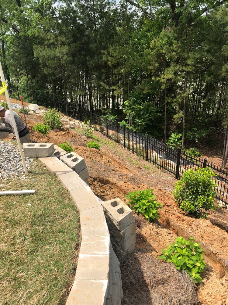 Placing Retaining Wall — Flowery Branch, GA — All About Irrigation & Landscape Services