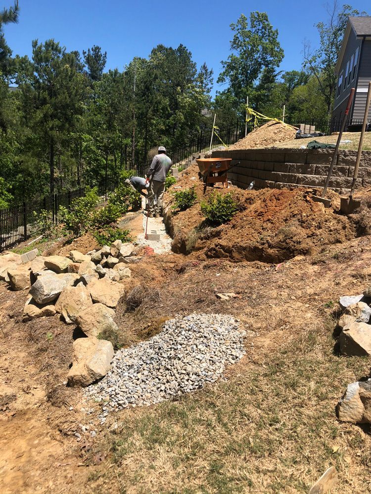 Working on Backyard — Flowery Branch, GA — All About Irrigation & Landscape Services