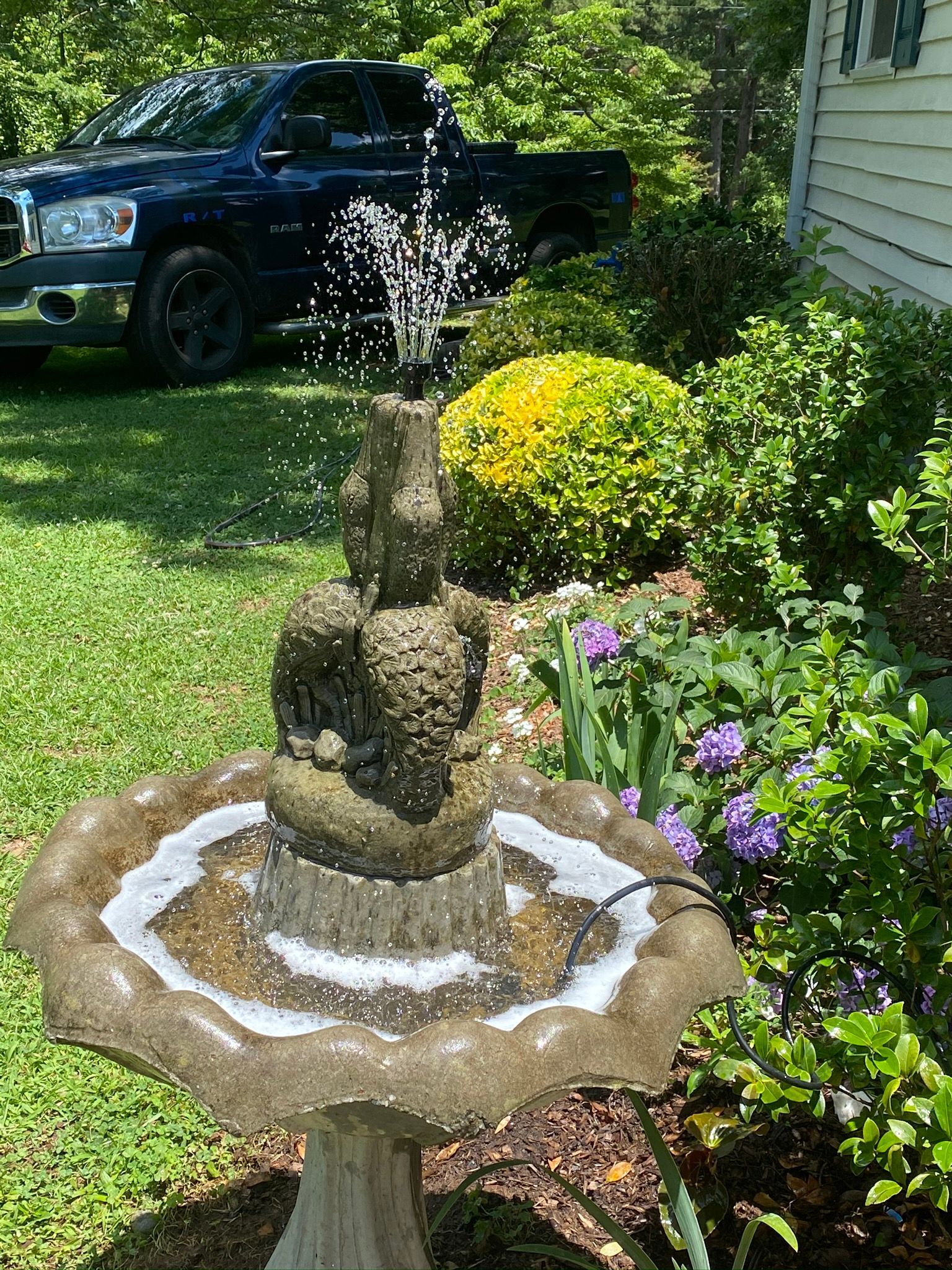 Fountain with Water Flowing — Flowery Branch, GA — All About Irrigation and Landscape Services Inc