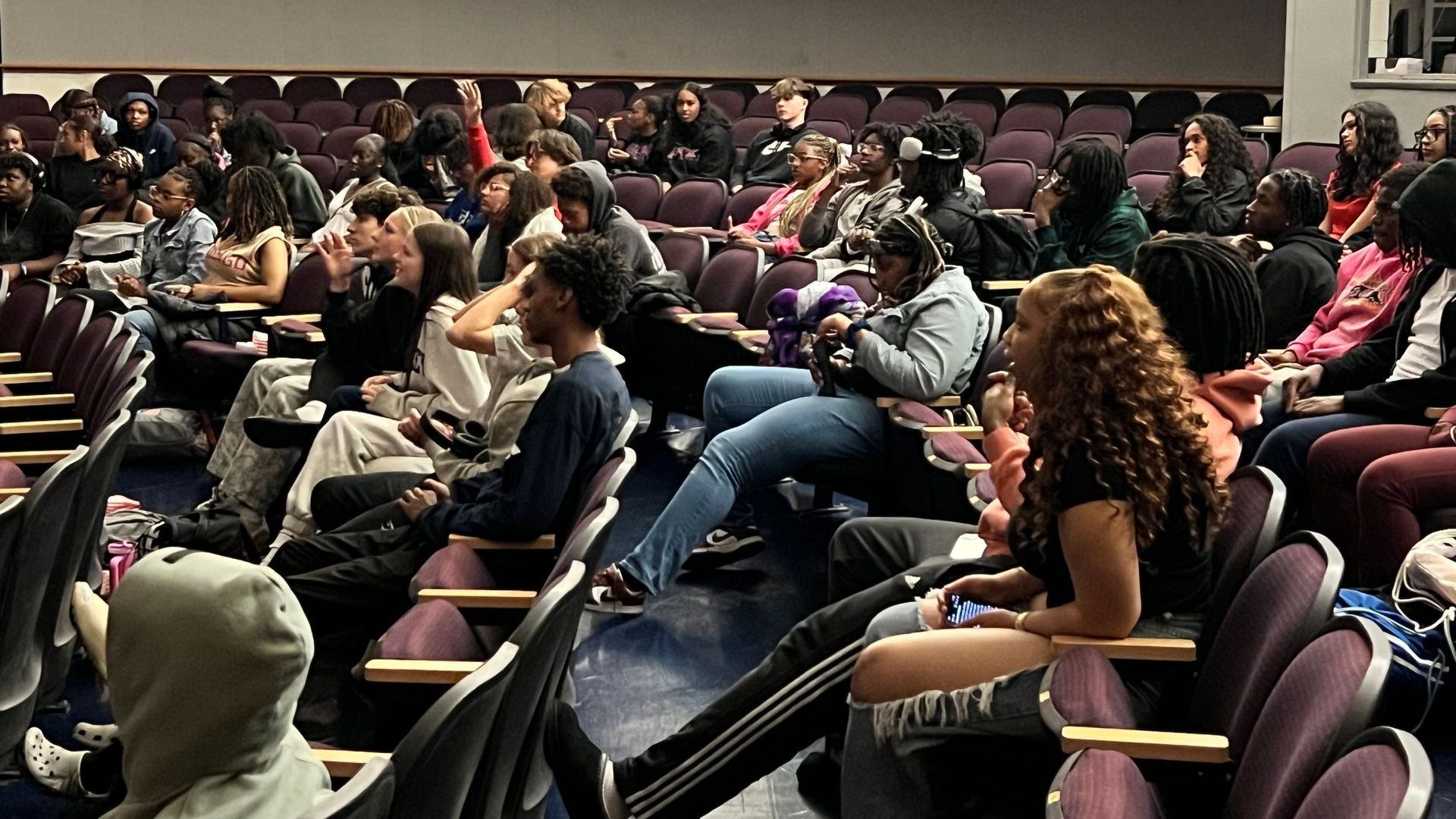 High schoolers watch The Forge together at school