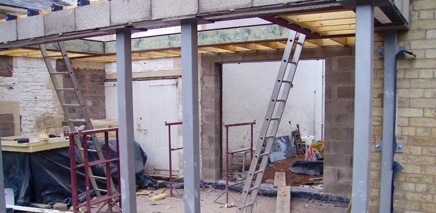Steel ladders in a half-built house with steel structures